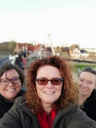 Howest’s Head of International Office Isabelle Pertry with Furman’s Nancy Georgiev & Caitlynne GoodlettIn Kortrijk Belgium, showing them the bridge that resembles one in Greenville, South Carolina